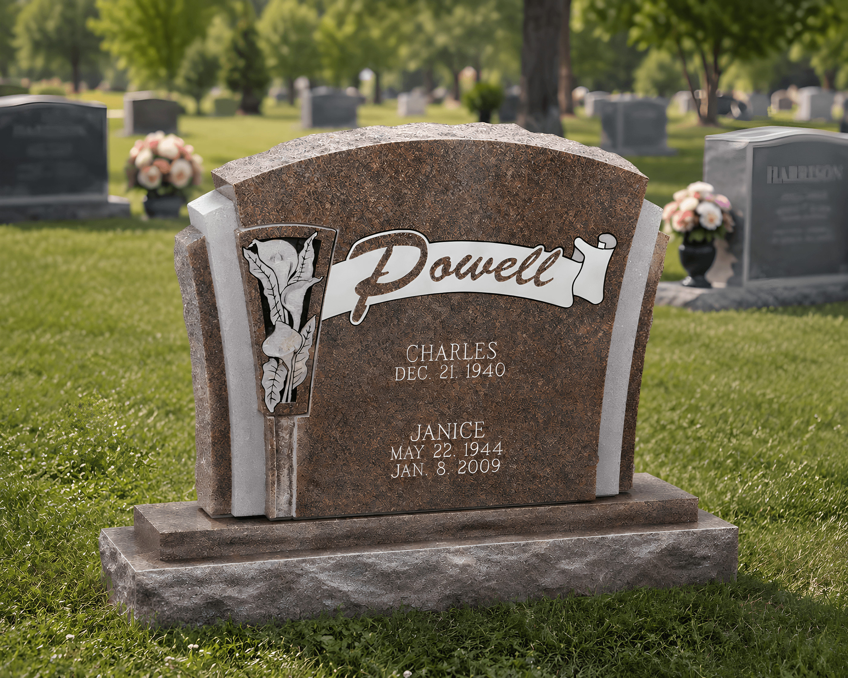 A lily engraved upright headstone in a cemetery.